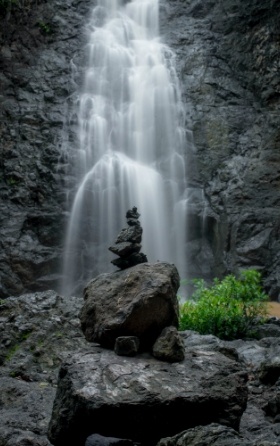 stacked stones in front of Montezuma Waterfall