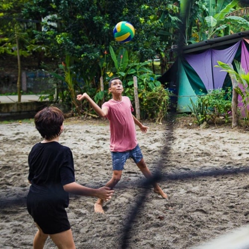 boy hitting volley ball