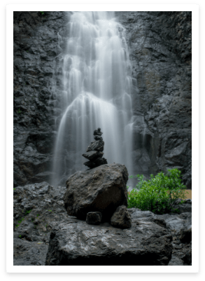 stone stack in front of Montezuma waterfall